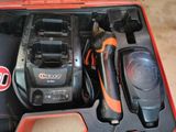 a tool in the case that is sitting on the floor