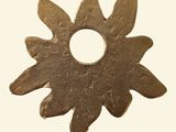 a metal object that looks like a sunflower