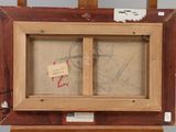 an old wooden easel with a drawing of a ship on it