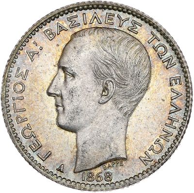 gros plan d'une pièce de monnaie sur laquelle figure un visage de femme