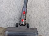 a vacuum that is sitting on the ground