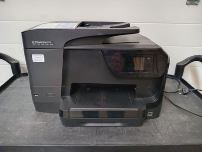a printer that is sitting on top of a table