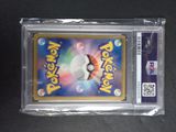 a close up of a pokemon card in a plastic case