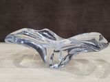 a glass bowl that is sitting on a table