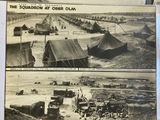 an old photo of a group of military vehicles parked in a field