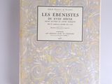 un livre à la couverture jaune et blanche posé sur une table
