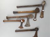 several different types of axes are displayed on a white surface