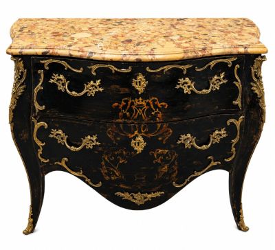 a black and gold chest of drawers with a marble top