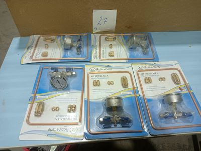 four different types of valves on the table