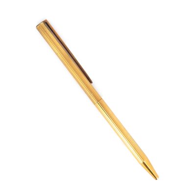 a close up of a pen on a white surface with a white background