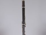 a black and silver pen sitting on top of a glass table