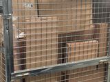 many boxes on a cart in the warehouse