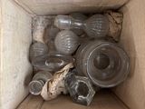 a box full of empty glass bottles in it
