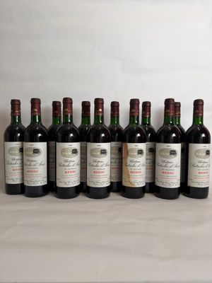 six bottles of wine are lined up on a table