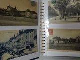 an open book with pictures of buildings on it