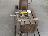 a machine that is sitting on a pallet on the ground