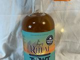 a bottle of rum that is sitting on a table