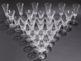a lot of empty wine glasses on the table