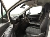 the interior of a white car with black seats and a steering wheel