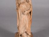 an image of a statue of a woman holding a child