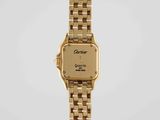 an image of a gold plated wrist watch on a white background
