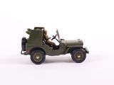 a toy army jeep with a man in the driver seat