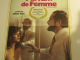 the poster for the movie parfum de femme is hanging on the wall