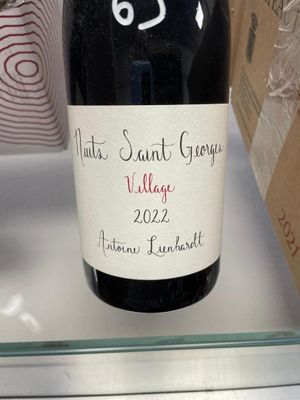 a bottle of wine that is on display in a store