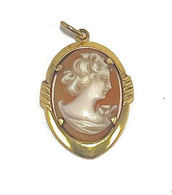 an image of a woman ' s profile is shown in a gold - plated pendant