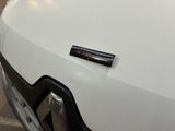 a sticker on the front of a white truck