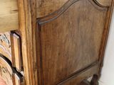 a dresser with a drawer on top of it in a room