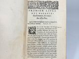 an open book with a black and white drawing on it