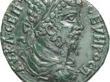 une pièce de monnaie romaine antique représentant la tête d'un homme coiffé d'une couronne