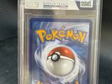 a close up of a pokemon card in a plastic case