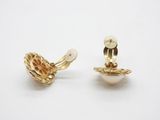 a pair of gold plated earrings with pearls on a white background