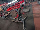 a large gym with a lot of machines in it