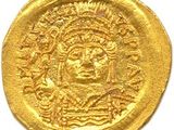 une pièce d'or portant l'image d'un homme