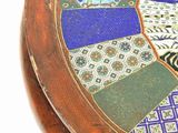 a round table with a colorful design on it