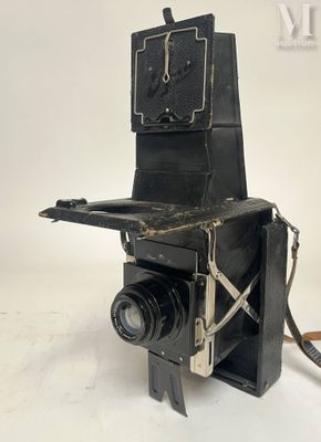 an old camera that is sitting on a table