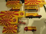 many different types of toy trucks on the table