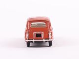 a red toy car that is sitting on a white surface