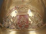 a gold helmet with a crown on top of it