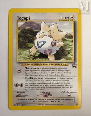 a close up of a pokemon card on a table