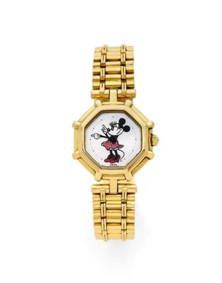 a close up of a wrist watch with a mickey mouse face