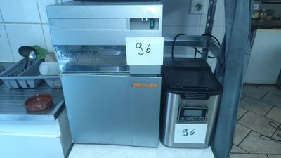 an image of a kitchen with a microwave and a dishwasher