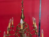 a chandelier with many lights hanging from it