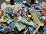 a pile of various items that are on a table
