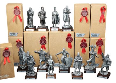 a lot of silver figurines that are on display