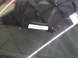 a luggage bag that is sitting in the back seat of a car