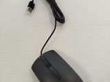 a black computer mouse with a cord attached to it
